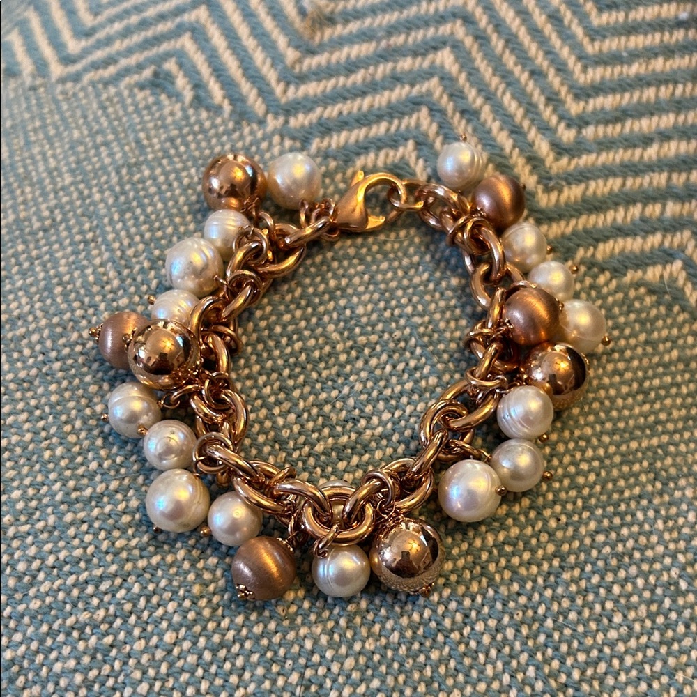 Elegant Gold and Pearl Charm Bracelet